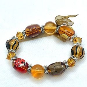 Neutral Warm Toned Glass Beads Bracelet With Hand Painted Animal Design